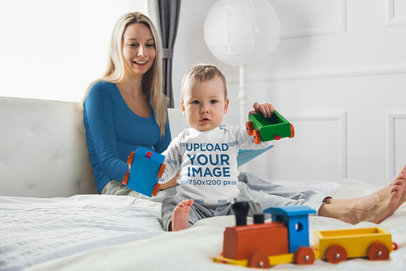 Long Sleeve Onesie Mockup of a Baby Boy Playing with Toys