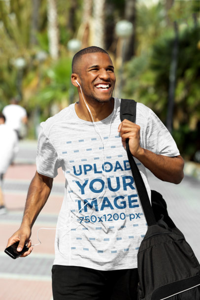 Mockup of a Man Wearing a Loose Heathered T-Shirt