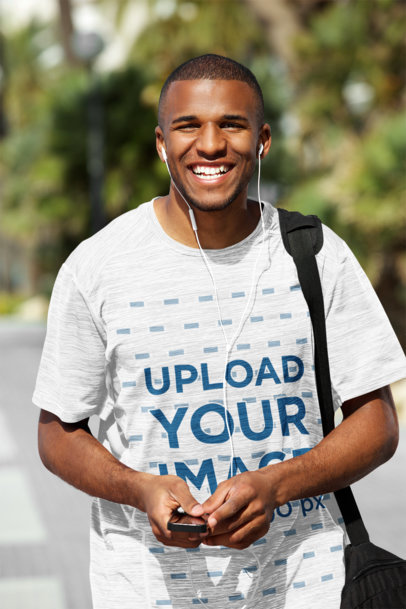 Mockup of a Happy Young Man Wearing a Loose T-Shirt