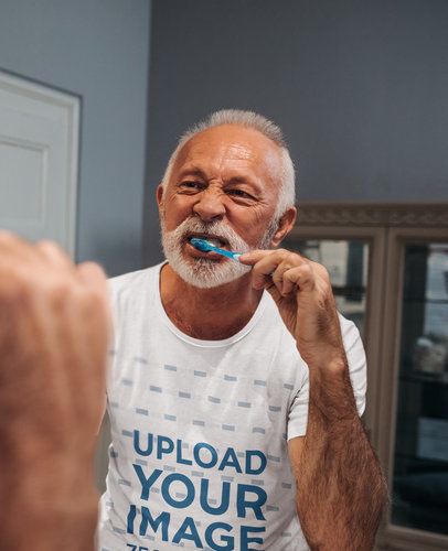 T-Shirt Mockup of a Senior Man Brushing His Teeth 39164-r-el2