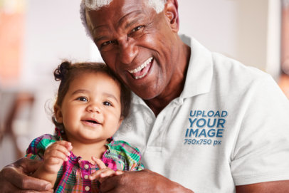 Polo Shirt Mockup of a Senior Man Holding His Granddaughter 39045-r-el2