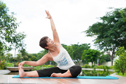 Tank Top Mockup of a Female Yogi Practicing Outside
