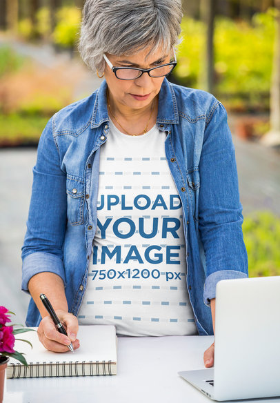 T-Shirt Mockup of a Middle-Aged Woman Taking Notes 39298-r-el2