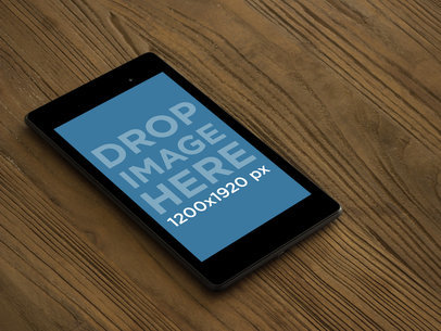 Nexus 7 Black Portrait Slanted Brown Wooden Desktop Shot