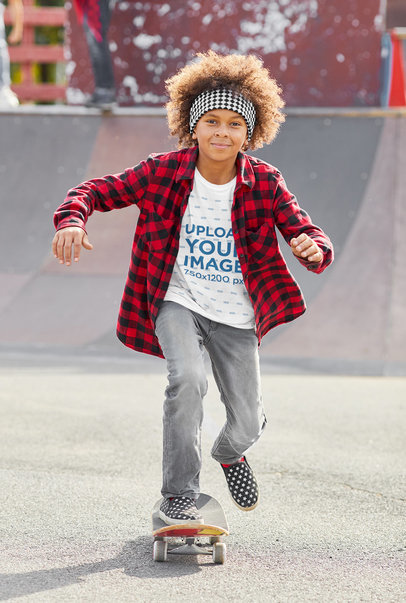 T-Shirt Mockup Featuring a Cool Kid Skateboarding 