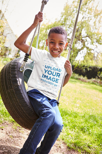 T-Shirt Mockup Featuring a Smiling Kid at a Tire Swing 35181r-el2
