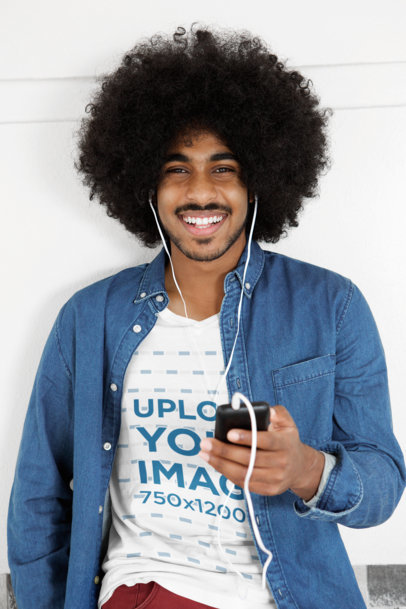 T-Shirt Mockup of a Man with Curly Hair Listening to Music 38972-r-el2