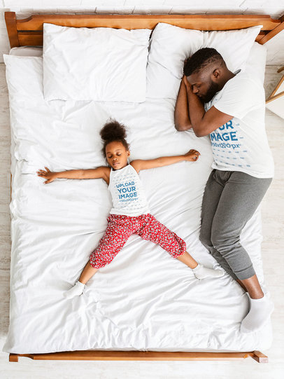 T-Shirt and Tank Top Mockup Featuring a Dad and His Daughter Taking a Nap