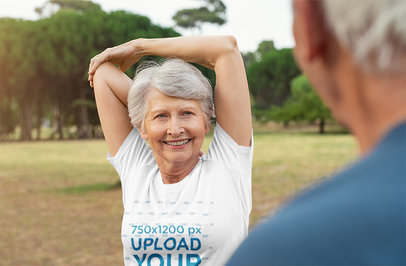 T-Shirt Mockup Featuring a Senior Woman Warming Up