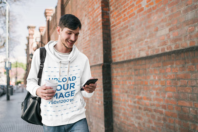 Hoodie Mockup of a Man Walking to College 