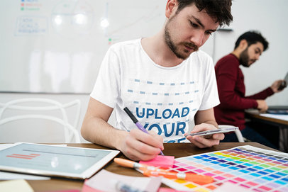 T-Shirt Mockup of a Man Taking Notes at Class 39167-r-el2