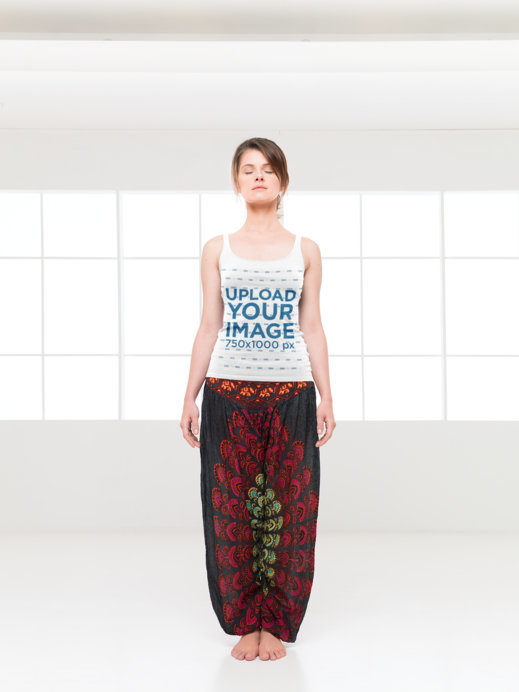Tank Top Mockup of a Woman Doing a Standing Meditation 