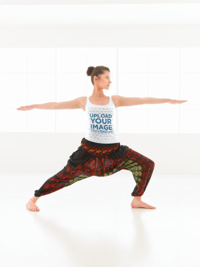 Tank Top Mockup of a Woman Standing in Warrior Two Pose 