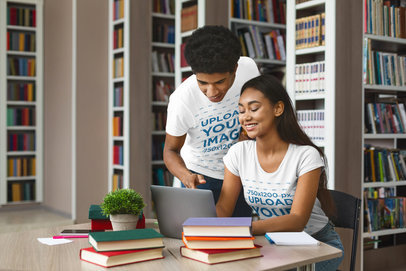 T-Shirt Mockup Featuring a Couple of Students at a Library