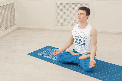 Sleeveless Shirt Mockup of a Man Meditating on a Yoga Mat