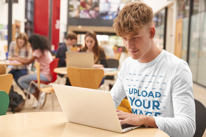 Long-Sleeve Tee Mockup of a Young Man at a Library