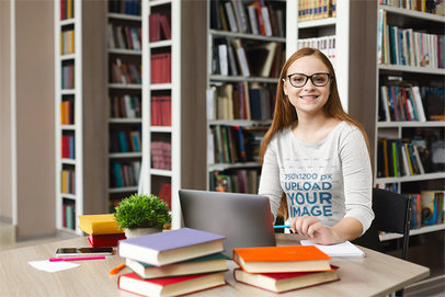 Long Sleeve Tee Mockup of a Woman Studying at the Library