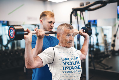 T-Shirt Mockup of a Senior Man Training at the Gym
