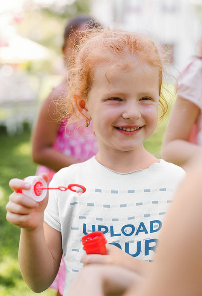 T-Shirt Mockup of a Little Girl Blowing Bubbles 39284-r-el2