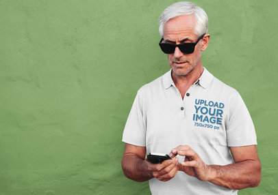 Polo Shirt Mockup of a Man with Sunglasses Texting 
