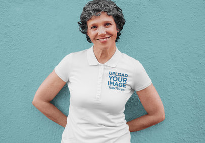 Mockup of a Smiling Elderly Woman Wearing a Polo Shirt