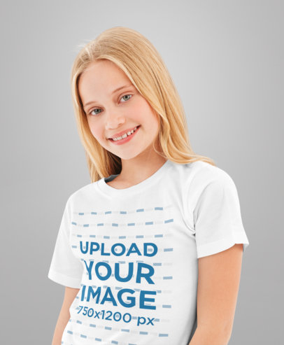Round Neck-Tee Mockup Featuring a Smiling Girl at a Studio