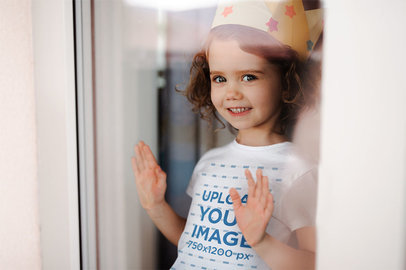 T-Shirt Mockup of a Little Girl with a Paper Crown