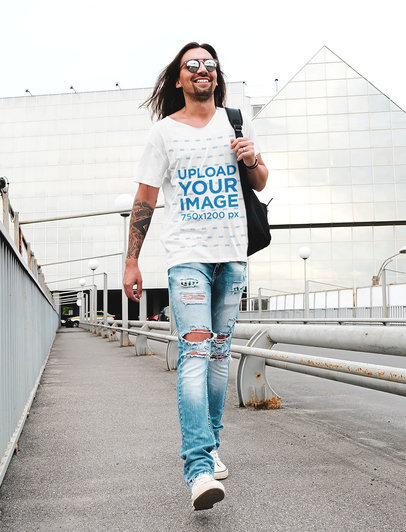T-Shirt Mockup of a Tattooed Long-Haired Man with Ripped Jeans 38244r-el2