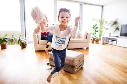 Long Sleeve Tee Mockup of a Girl Running With a Teddy Bear in Her Hand