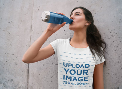 T-Shirt Mockup Featuring a Woman Drinking Water 