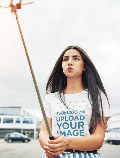 T-Shirt Mockup of a Woman Using a Selfie Stick 39149-r-el2