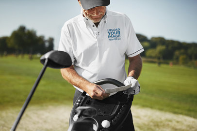 Polo Shirt Mockup of a Man at a Golf Field