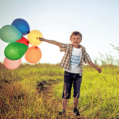 T-Shirt Mockup of a Boy Holding a Bunch of Balloons 39294-r-el2