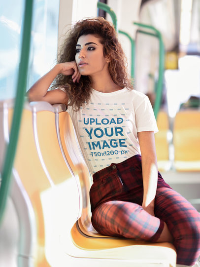 T-Shirt Mockup of a Young Woman in the Subway 