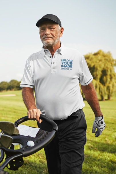 Polo Shirt Mockup Featuring a Senior Man at a Golf Course