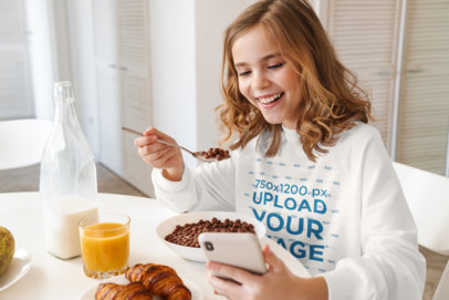 Sweatshirt Mockup of a Girl Eating Cereal
