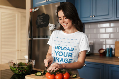 T-Shirt Mockup of a Woman Cooking Vegetables