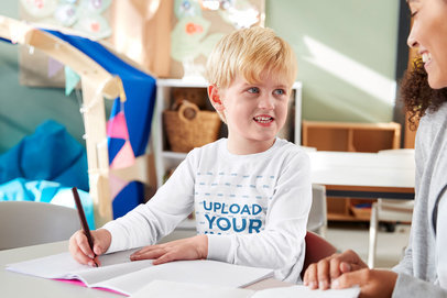 Long Sleeve Tee Mockup of a Little Boy Talking with Her Teacher