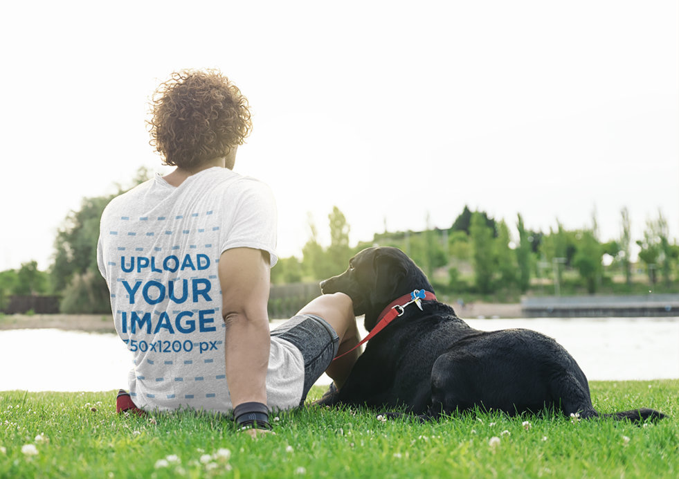 Back-View T-Shirt Mockup of a Man Chilling with His Dog