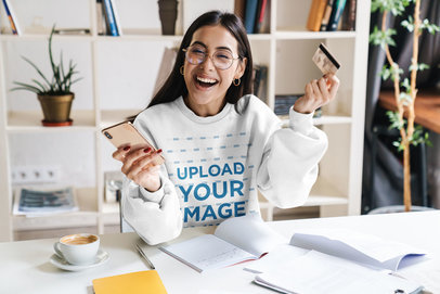 Sweatshirt Mockup of a Woman Shopping from Home