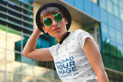 Sublimated T-Shirt Mockup Featuring a Stylish Woman With an Androgynous Look 