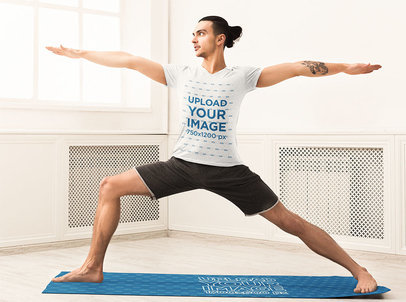 T-Shirt Mockup of a Man Practicing on a Yoga Mat