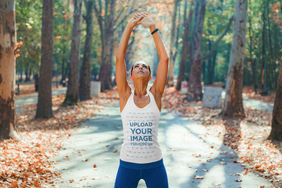 Tank Top Mockup Featuring a Woman Stretching at a Park