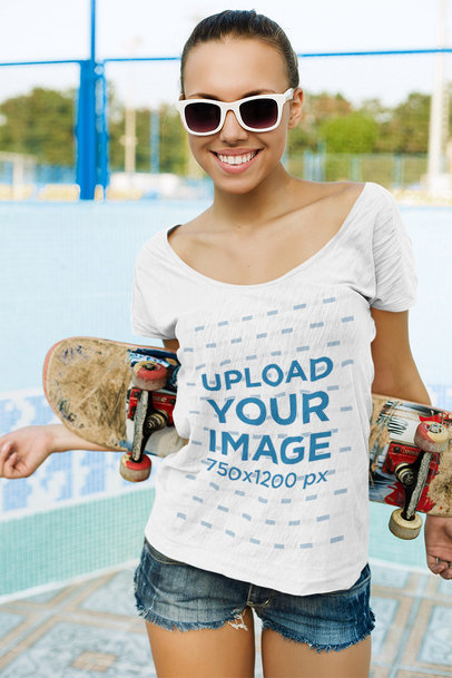 T-Shirt Mockup of a Happy Woman with a Skateboard