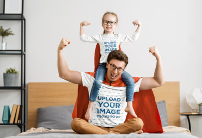 T-Shirt Mockup of a Girl and Her Dad Dressed as Superheroes