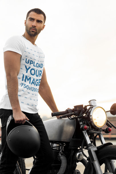 Mockup of a Man in a T-Shirt Posing Next to His Motorcycle