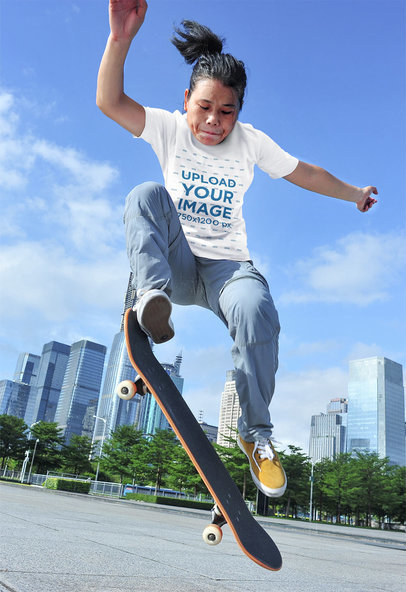 T-Shirt Mockup Featuring a Woman Doing a Skating Trick