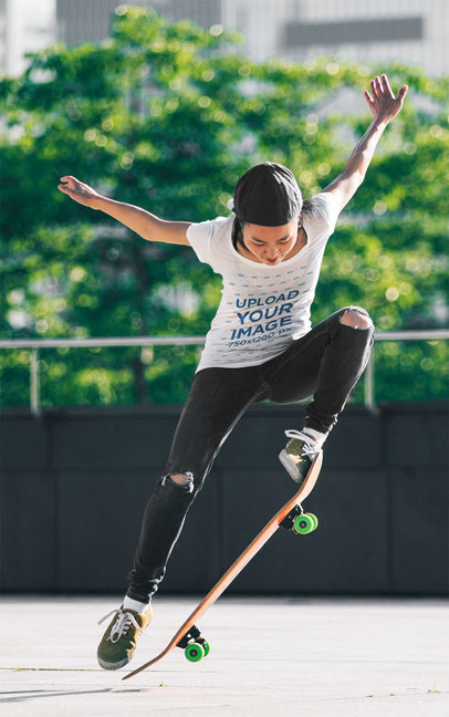 T-Shirt Mockup of a Female Skater Doing a Trick 