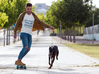 T-Shirt Mockup of a Man Skating with His Dog