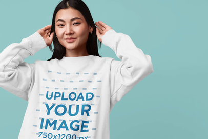 Sweatshirt Mockup of a Woman Fixing Her Hair at a Studio